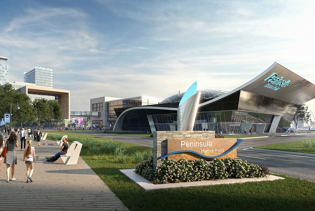 Guests utilize the pier next to the Peninsula Harborpoint entrance sign